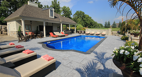 Using Natural Stone Pavers for Pool Decks: Safety, Style, and Functionality